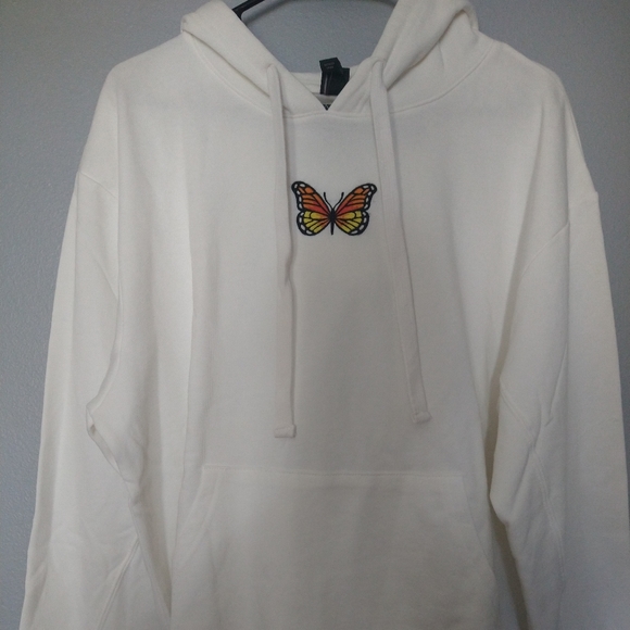 Wild Fable white hoodie with embroidered butterfly on front, size M.